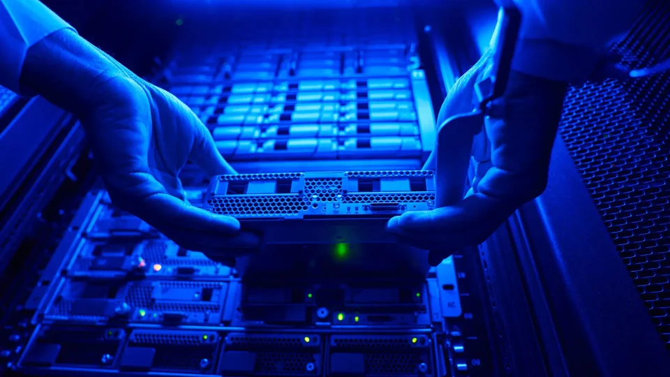 Unrecognized it engineer find and troubleshooting server computer in data center; Shutterstock ID 2052715709; purchase_order: -; job: -; client: -; other: